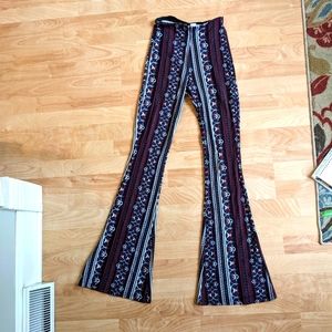 Divided funky bell bottom pants with colors of maroon, blue, white and black